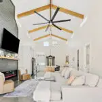 custom wood beam vaulted ceiling in a custom contractor home